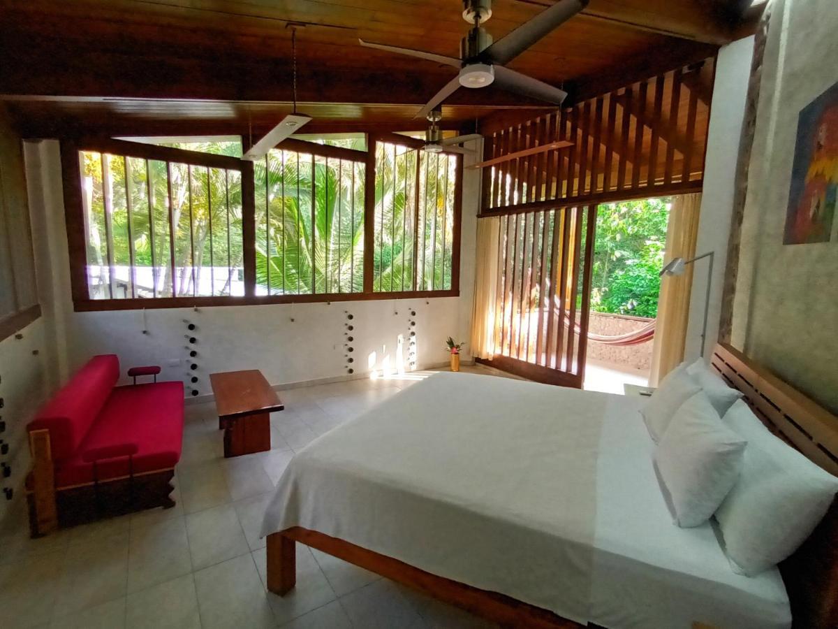 Omega Tours Eco-Jungle Lodge La Ceiba Bagian luar foto